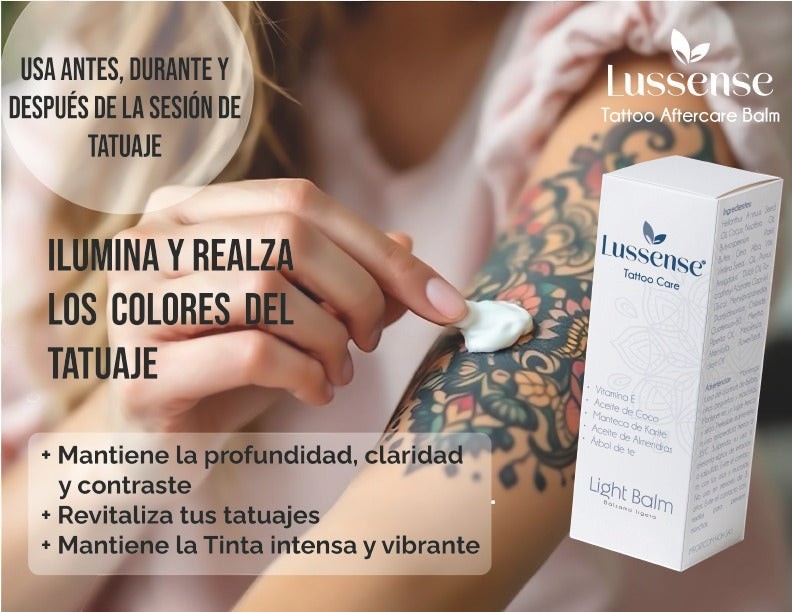 Lussense Tattoo Aftercare Light Balm in a white box, with a hand applying the balm to a colorful tattooed arm.